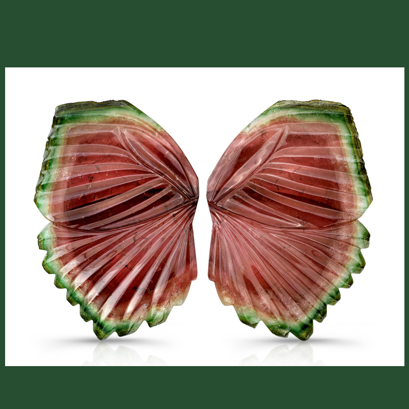 Watermelon tourmaline (877.60 ct) butterfly carving & photo from Evan Caplan Rare & Fine Gemstones – by Renée Newman